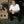 Man sitting in a warehouse with boxes and a display of underwear, featuring 'Axell Hodges Signature Series'.